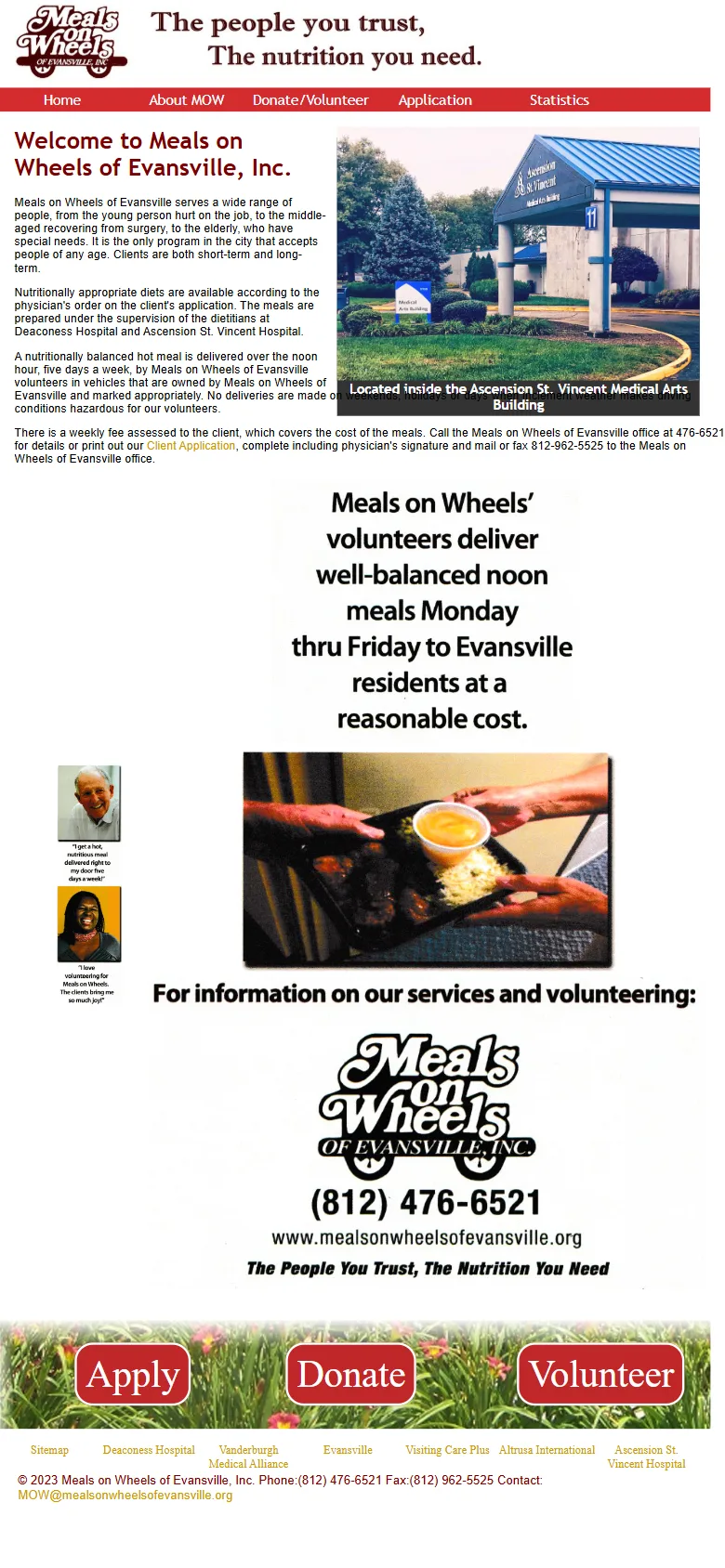 The old Meals on Wheels of Evansville homepage on a phone: the whole desktop page is shrunk to fit, with tiny red and brown text and image-based buttons.